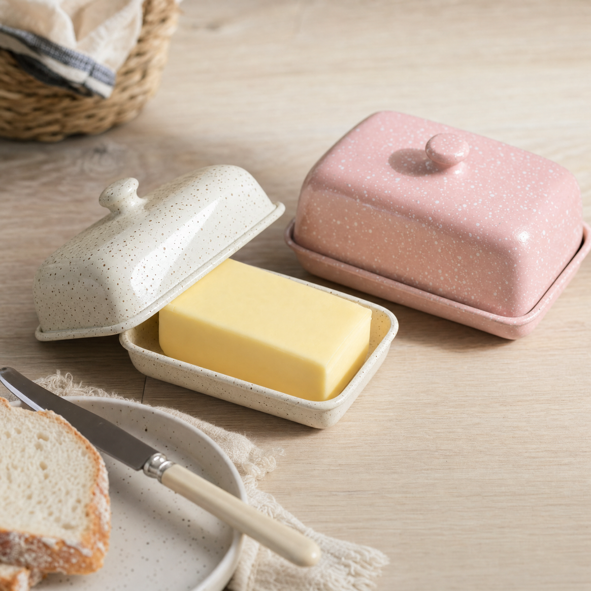 Ivory and blush speckled enamel butter dishes